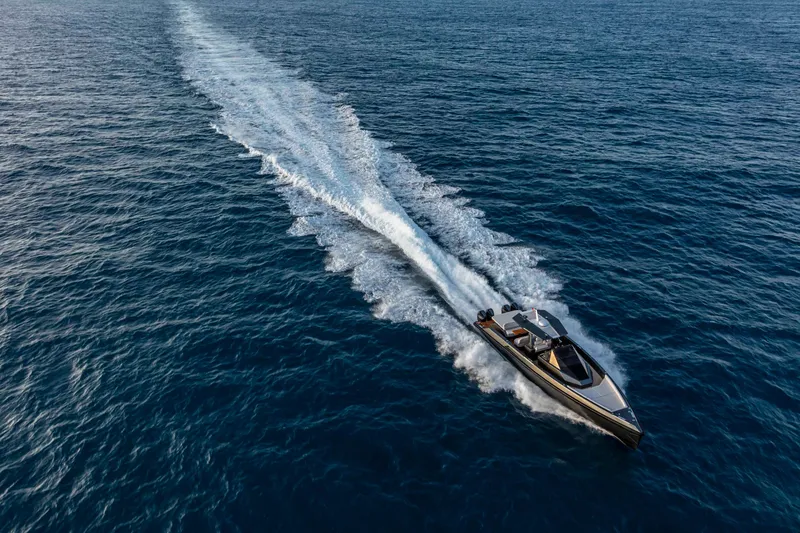 Slide: The Image of Wally wallytender48X 2026 cruising on open sea, aerial view. - 37