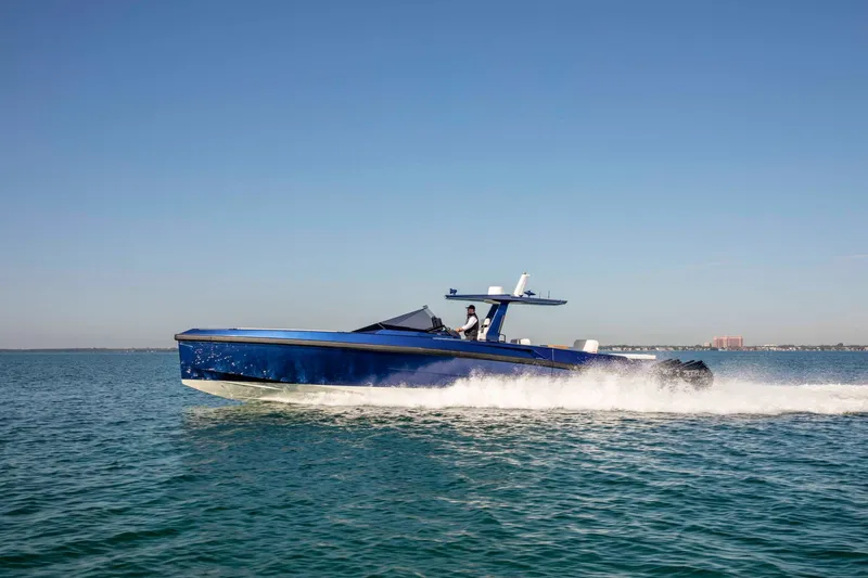 Slide: The Image of Wally wallytender48X 2026 on water, blue yacht cruising at speed. - 41