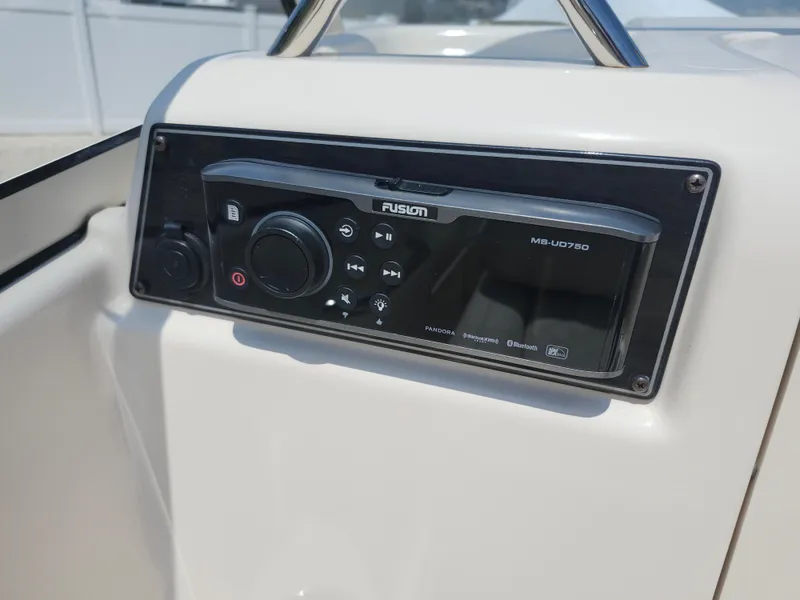Slide: The Image of Fusion MS-UD750 audio system on 2018 Grady-White Freedom 215 boat dashboard. - 12