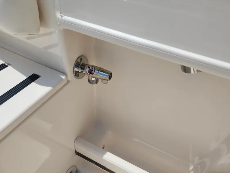 Slide: The Image of 2018 Grady-White Freedom 215 boat interior detail with stainless steel fitting. - 14