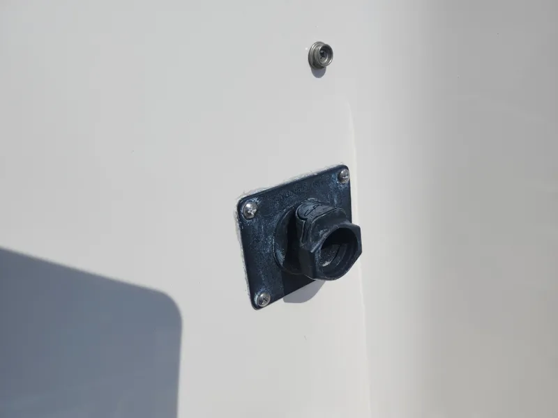 Slide: The Image of Close-up of a 2018 Grady-White Freedom 215 boat fitting on the hull. - 15