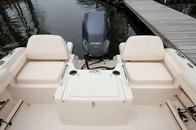 Slide: The Image of Manufacturer Provided Image: 2018 Grady-White Freedom 215 boat interior with Yamaha 200 outboard motor. - 20