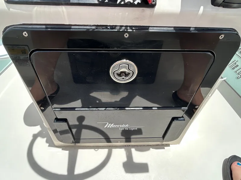 Slide: The Image of 2011 Maverick Mirage 17HPX-Tunnel boat compartment with lock and logo. - 10