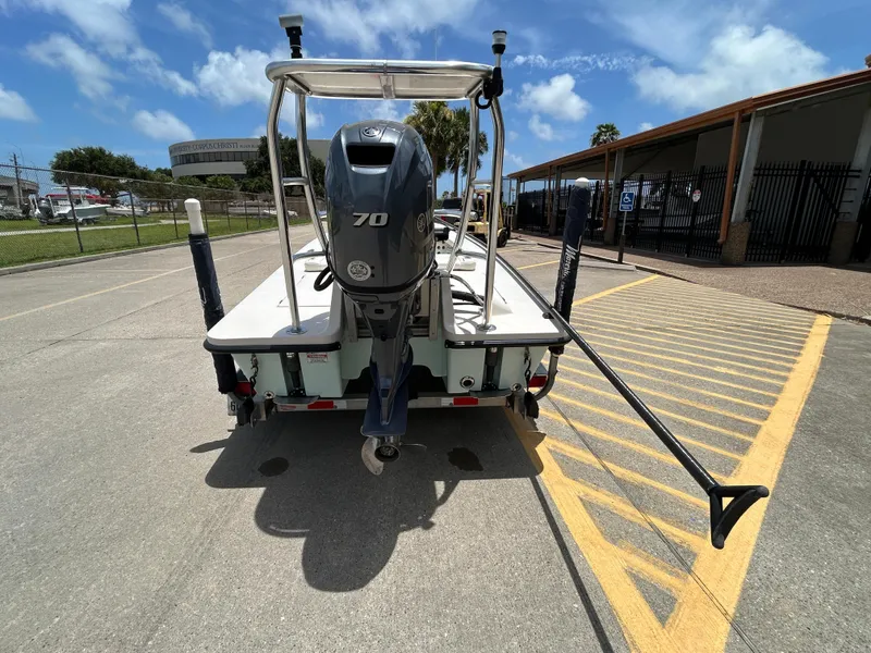 Slide: The Image of 2011 Maverick Mirage 17HPX-Tunnel boat with 70HP engine, parked outdoors on a sunny day. - 3