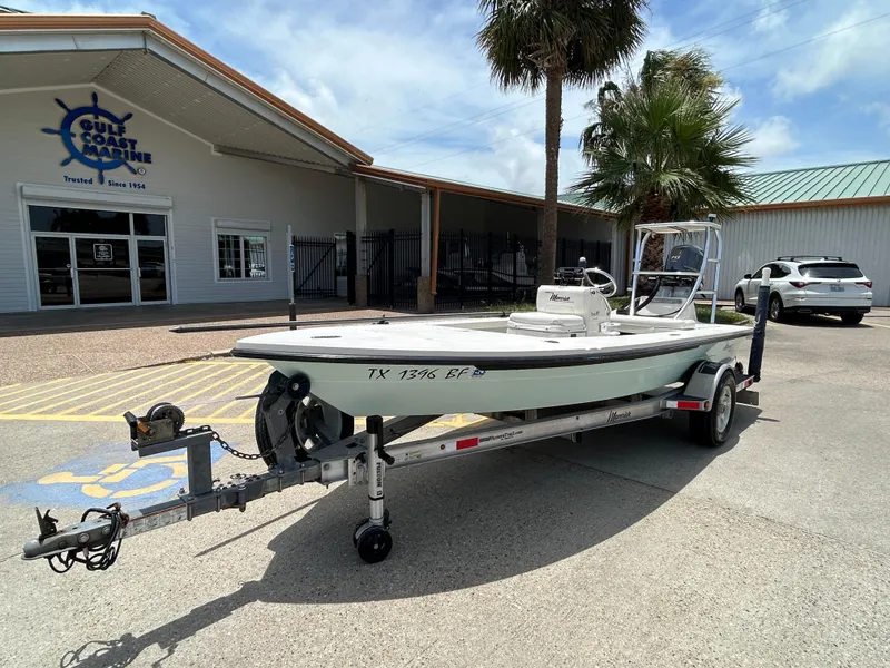 Slide: The Image of 2011 Maverick Mirage 17HPX-Tunnel boat on trailer outside Gulf Coast Marine. - 4
