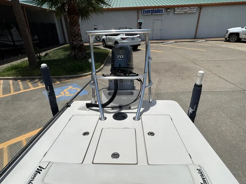 Slide: The Image of 2011 Maverick Mirage 17HPX-Tunnel boat with Yamaha 70 engine, parked outdoors. - 7