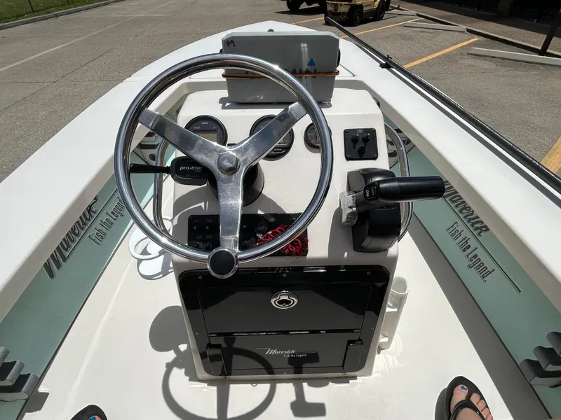 Slide: The Image of 2011 Maverick Mirage 17HPX-Tunnel boat console with steering wheel and controls. - 9