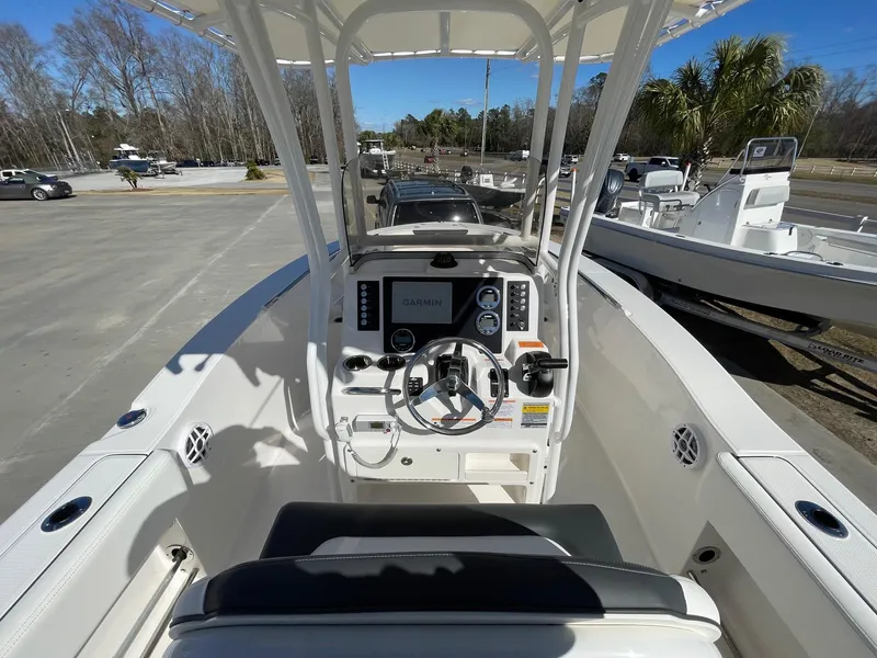 Slide: The Image of 2023 Robalo R202 Explorer boat dashboard with Garmin navigation system. - 11