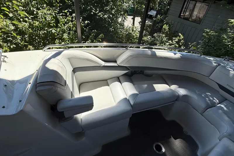 Slide: The Image of 2017 Formula 270 Bowrider interior with plush seating and sleek design. - 13