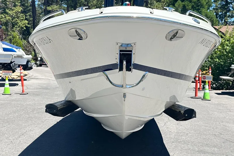 Slide: The Image of 2017 Formula 270 Bowrider boat on trailer in outdoor setting. - 3