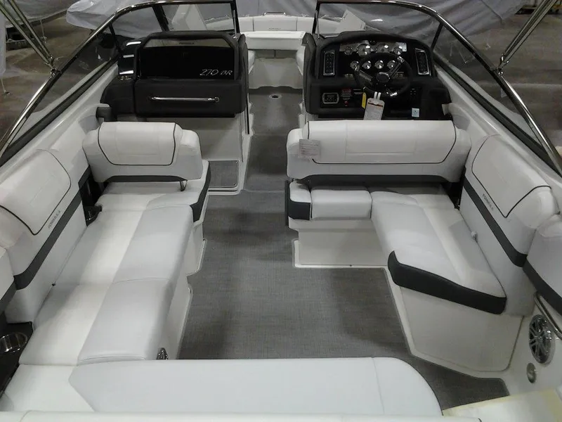 Slide: The Image of 2017 Formula 270 Bowrider interior with white seating and modern dashboard. - 5