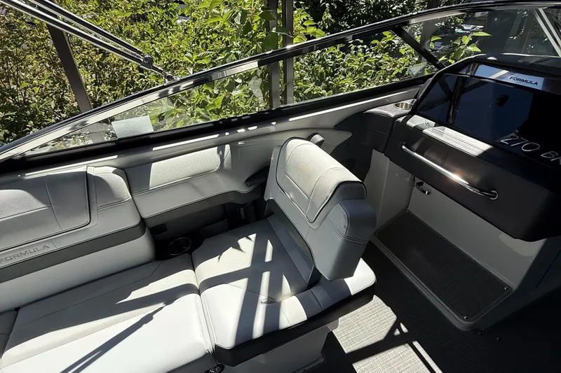 Slide: The Image of 2017 Formula 270 Bowrider interior with sleek seating and modern dashboard design. - 7