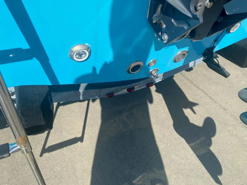 Slide: The Image of 2023 Key West 189 FS boat rear view, showing blue hull and fittings. - 4