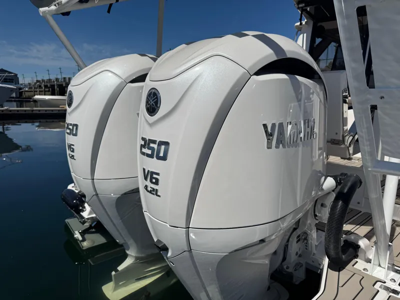 Slide: The Image of Twin Yamaha 250 V6 outboard engines on a 2025 Cutwater C-288 Coupe boat. - 27