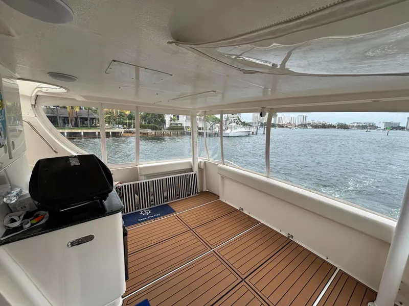 Slide: The Image of Spacious interior of 2000 Silverton 453 Motor Yacht with waterfront view. - 18