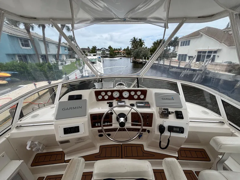 Slide: The Image of Cockpit view of 2000 Silverton 453 Motor Yacht with Garmin navigation system. - 9