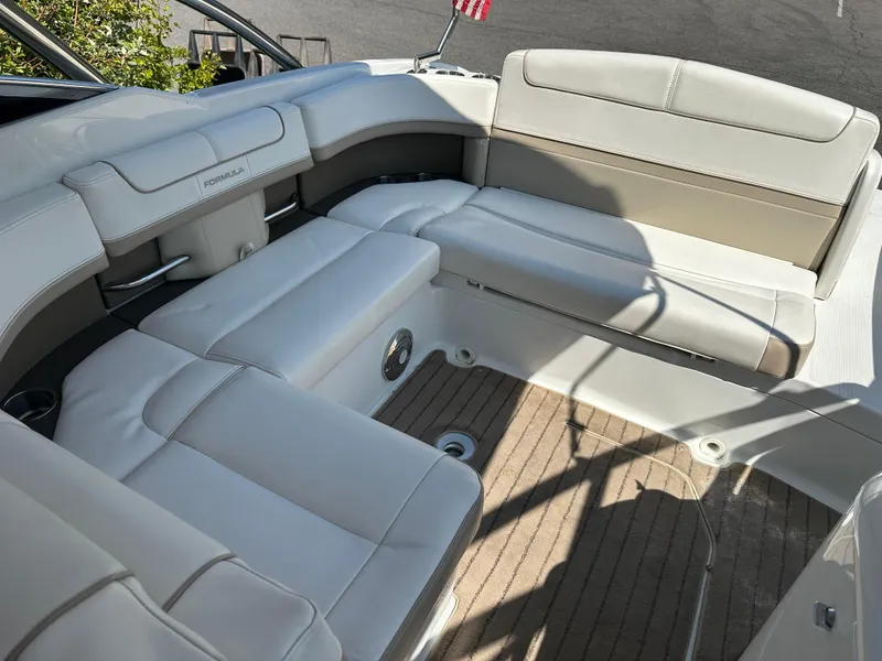 Slide: The Image of 2013 Formula 290 Bowrider interior with spacious seating and elegant design. - 11