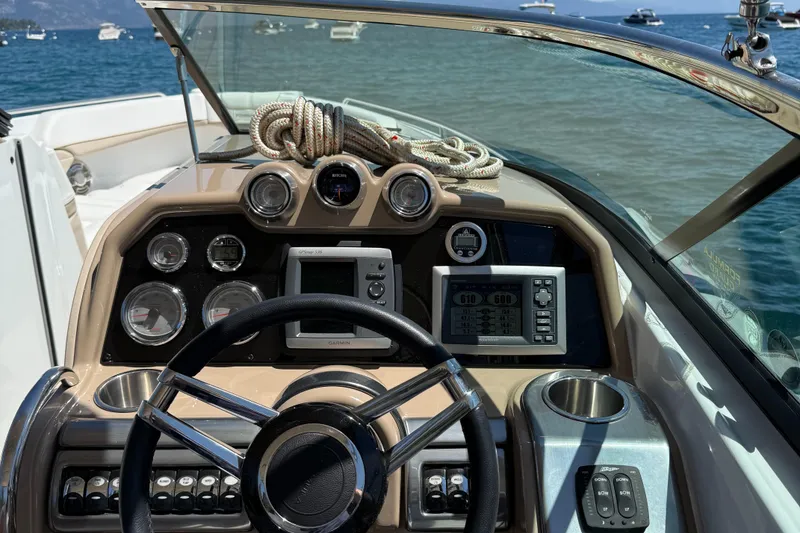 Slide: The Image of Dashboard of a 2013 Formula 290 Bowrider boat with navigation instruments. - 17