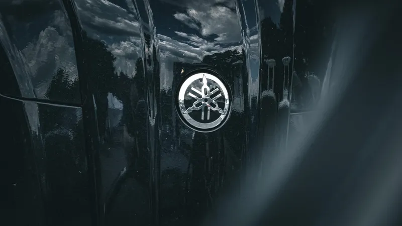 Slide: The Image of Close-up of 2026 Skeeter ZXE 20 emblem on glossy black surface. - 10