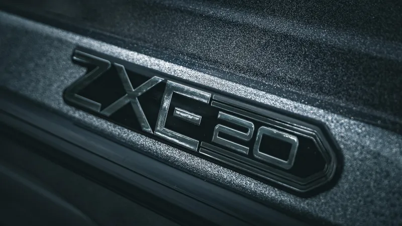 Slide: The Image of Close-up of 2026 Skeeter ZXE 20 logo on textured surface. - 14