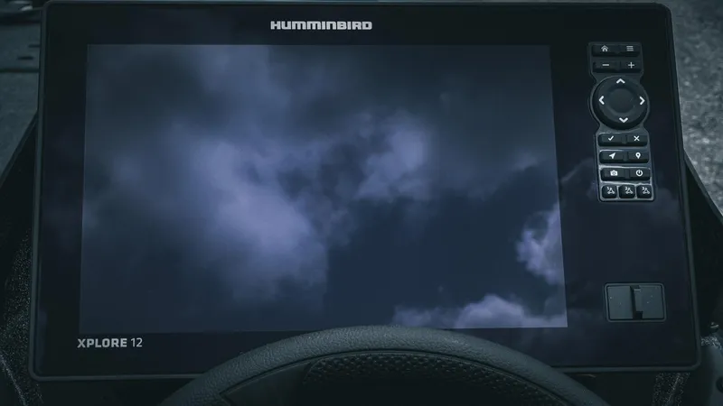 Slide: The Image of Humminbird Xplore 12 display on 2026 Skeeter ZXE 20 boat dashboard. - 24