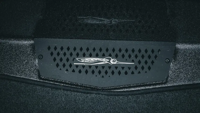 Slide: The Image of 2026 Skeeter ZXE 20 boat detail with logo on textured surface. - 25