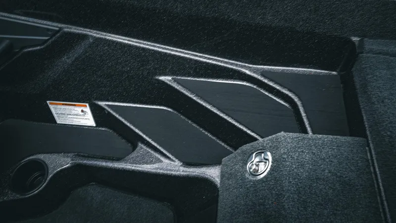 Slide: The Image of Interior detail of 2026 Skeeter ZXE 20 boat, featuring sleek design and textured surfaces. - 35