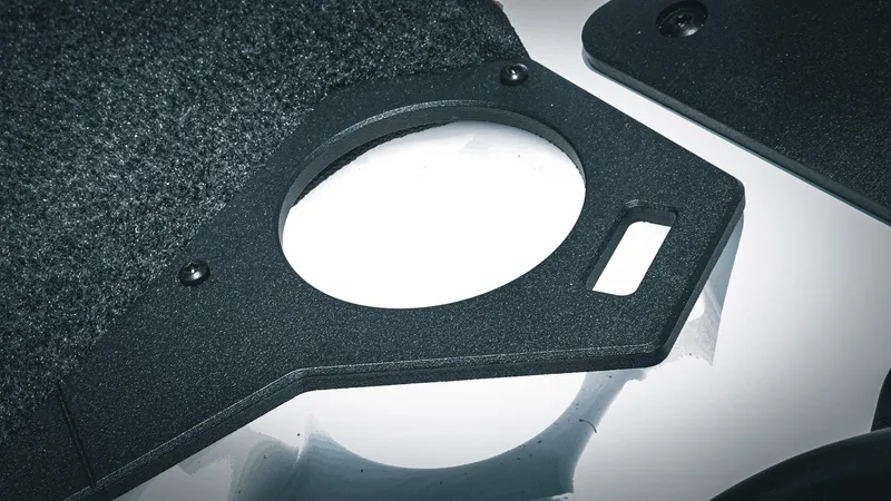 Slide: The Image of Close-up of Skeeter ZXE 20 2026 boat component with textured surface and circular cutout. - 43