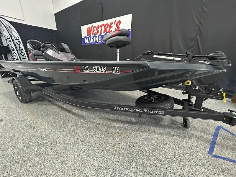 Slide: The Image of 2022 Ranger RT178C fishing boat on trailer in showroom. - 3