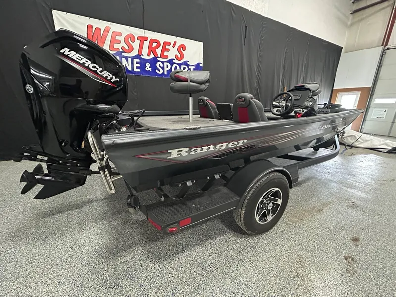 Slide: The Image of 2022 Ranger RT178C fishing boat with trolling motor and seating in showroom. - 9