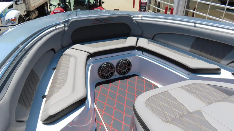 Slide: The Image of Luxurious interior of 2020 MTI 42V boat with cushioned seating and speakers. - 13