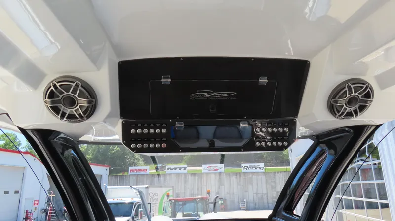 Slide: The Image of 2020 MTI 42V boat dashboard with speakers and control panel. - 22
