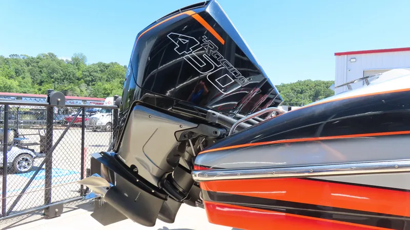 Slide: The Image of High-performance MTI 42V boat with Mercury Racing 450 engine, 2020 model, in a marina setting. - 6