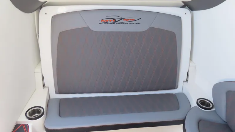 Slide: The Image of Gray seating area in a 2020 MTI 42V boat with cup holders. - 9