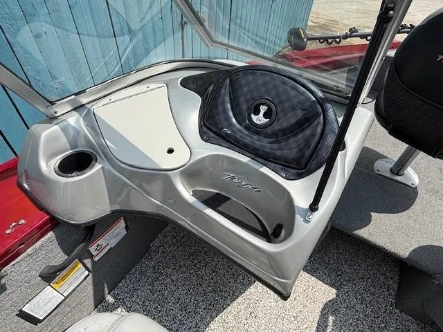 Slide: The Image of 2015 Tracker Targa V-18 Combo boat interior with steering wheel and dashboard. - 16