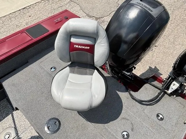 Slide: The Image of 2015 Tracker Targa V-18 Combo boat seat and motor on deck. - 31