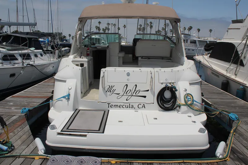 Slide: The Image of 2005 Cruisers Yachts 370 Express docked, rear view, with "My JoJo" nameplate, Temecula, CA. - 2