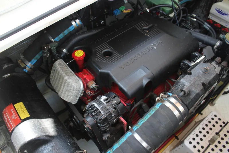 Slide: The Image of Engine compartment of a 2005 Cruisers Yachts 370 Express with Volvo Penta engine. - 39