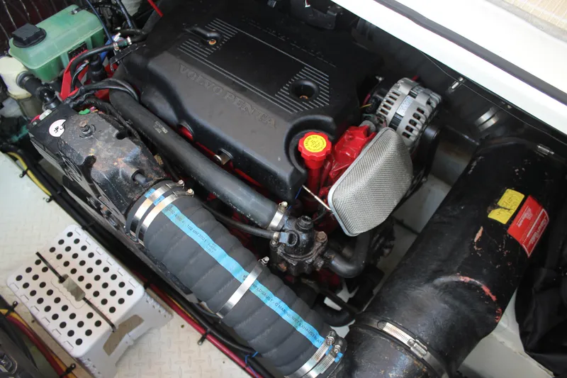Slide: The Image of Engine compartment of a 2005 Cruisers Yachts 370 Express, featuring a Volvo Penta engine. - 40