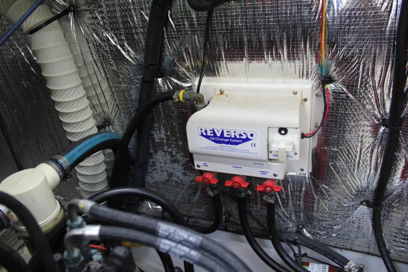 Slide: The Image of Engine room of 2005 Cruisers Yachts 370 Express with Reverso oil change system. - 43