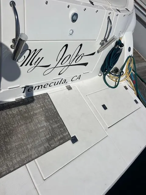 Slide: The Image of 2005 Cruisers Yachts 370 Express boat with "My JoJo" name, docked in Temecula, CA. - 47