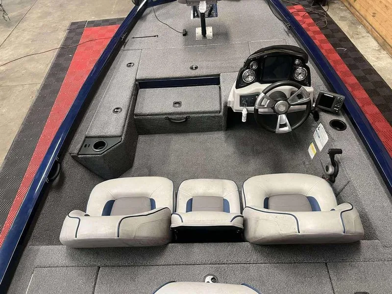 Slide: The Image of 2018 G3 Sportsman 17 boat interior with steering console and seating. - 9