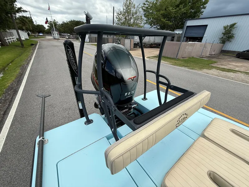 Slide: The Image of 2021 Hell's Bay Marquesa boat with Yamaha 115 engine on a road. - 16