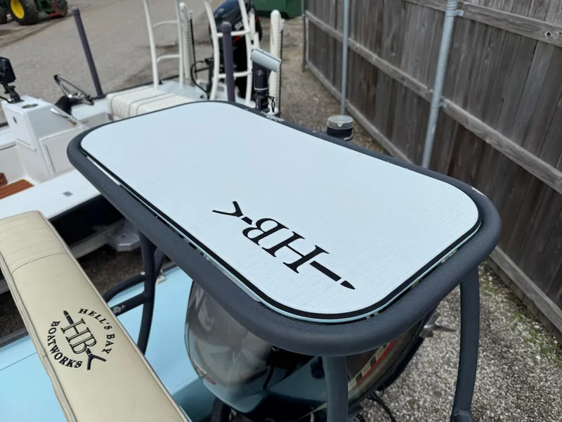 Slide: The Image of 2021 Hell's Bay Marquesa boat with custom HB logo on deck. - 18