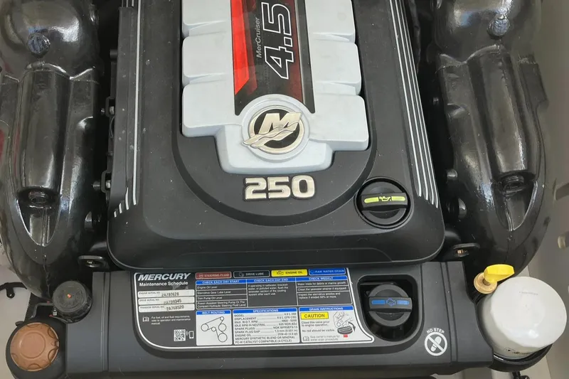 Slide: The Image of Engine of 2023 Sea Ray SPX 230 boat, featuring Mercury 4.5L 250 horsepower. - 19