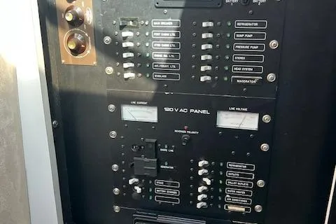 Slide: The Image of Electrical control panel on a 1990 Donzi 300 Levante boat. - 14