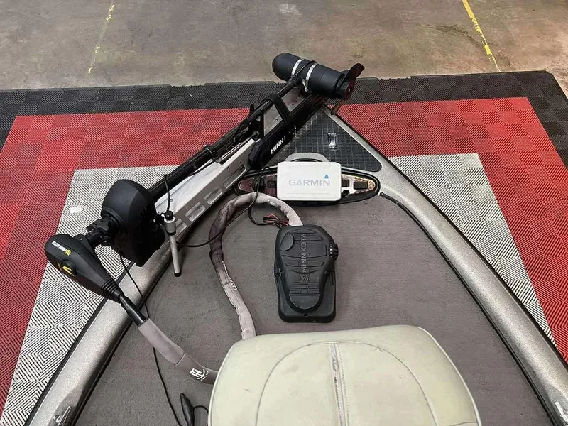 Slide: The Image of Triton TR20 boat deck with Garmin device and Minn Kota trolling motor, 2000 model. - 5