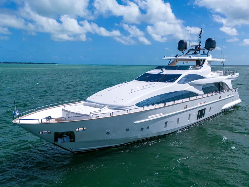 Slide: The Image of Luxurious 2012 Azimut Grande 105 yacht cruising on clear blue waters under a sunny sky. - 2