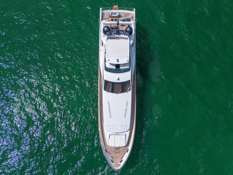 Slide: The Image of Azimut Grande 105 yacht, 2012 model, aerial view on green water. - 9