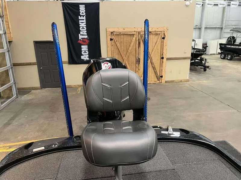 Slide: The Image of 2020 Nitro Z19 Pro boat seat in a showroom with tackle banner. - 6